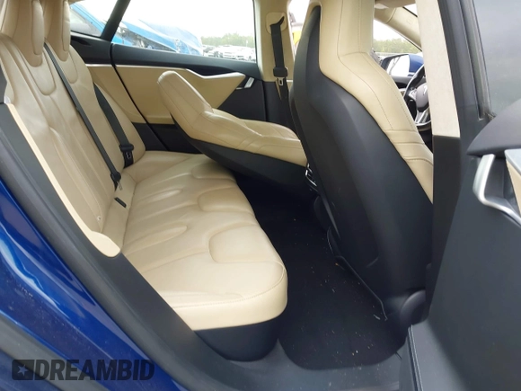 2016 Tesla Model S 70 with VIN 5YJSA1E10GF141725, listed as a IAAI auction lot 41878171 with 119,025 mi miles and . Bid and sale history available at DreamBid. Image 8.