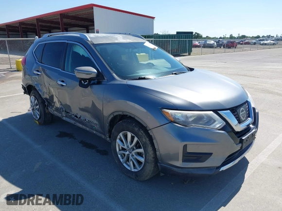 2017 Nissan Rogue SV with VIN KNMAT2MT9HP581822, listed as a IAAI auction lot 42140794 with 74,261 mi miles. Bid and sale history available at carsss.com. Image 1.