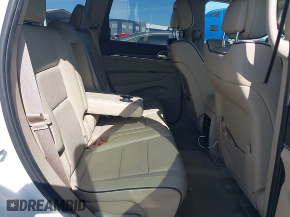 2017 Jeep Grand Cherokee Overland z VIN 1C4RJECG5HC959981, wystawiony jako IAAI lot #41638958 z przebiegiem 102 122 mil mil oraz . Historia ofert i sprzedaży dostępna na DreamBid. Obrazek 8.