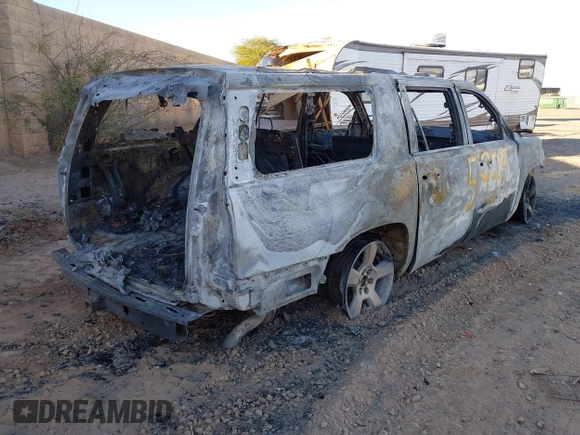 2019 Chevrolet Suburban LT with VIN 1GNSCHKC2KR395939, listed as a IAAI auction lot 41407596 with Not Provided miles and . Bid and sale history available at DreamBid. Image 4.