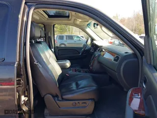2009 Chevrolet Suburban LTZ with VIN 1GNFK36329R291320, listed as a IAAI auction lot 41393816 with 157,469 mi miles. Bid and sale history available at carsss.com. Image 5.