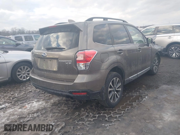 2017 Subaru Forester Touring with VIN JF2SJGWC1HH581460, listed as a IAAI auction lot 41326532 with 59,454 mi miles. Bid and sale history available at carsss.com. Image 4.