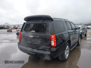2015 Chevrolet Tahoe LT with VIN 1GNSCBKC2FR632139, listed as a IAAI auction lot 41553087 with 142,775 mi miles and . Bid and sale history available at DreamBid. Image 6.