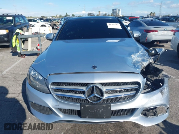 2018 Mercedes-Benz C 300 with VIN 55SWF4JB1JU244077, listed as a IAAI auction lot 41795613 with 90,900 mi miles and . Bid and sale history available at DreamBid. Image 12.