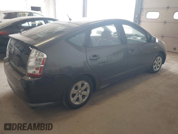 2007 Toyota Prius z VIN JTDKB20UX73266247, wystawiony jako IAAI lot #42149655 z przebiegiem 190 979 mil mil oraz . Historia ofert i sprzedaży dostępna na DreamBid. Obrazek 4.