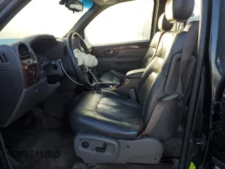 2004 GMC Envoy XL SLE with VIN 1GKET16S646128780, listed as a Copart auction lot 42220105 with 277,349 mi miles and Salvage Title. Bid and sale history available at carsss.com. Image 7.