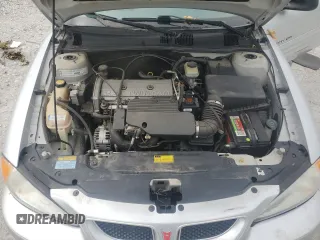 2001 Pontiac Grand Am with VIN 1G2NE12TX1M668035, listed as a Copart auction lot 59700585 with 60,965 mi miles and Salvage title. Bid and sale history available at DreamBid. Image 11.