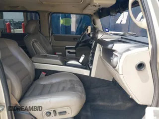 2003 Hummer H2 with VIN 5GRGN23U43H125114, listed as a IAAI auction lot 42160986 with 157,776 mi miles. Bid and sale history available at carsss.com. Image 5.