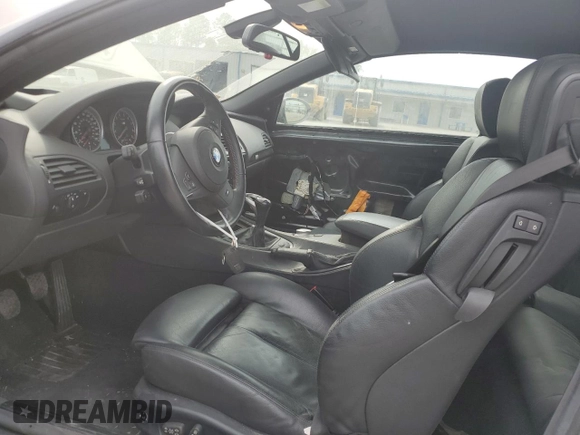 2007 BMW 6 Series M6 z VIN WBSEK93557CY78648, wystawiony jako Copart lot #52179345 z przebiegiem 22 453 mil mil oraz Szkoda całkowita • Salvage title. Historia ofert i sprzedaży dostępna na DreamBid. Obrazek 7.