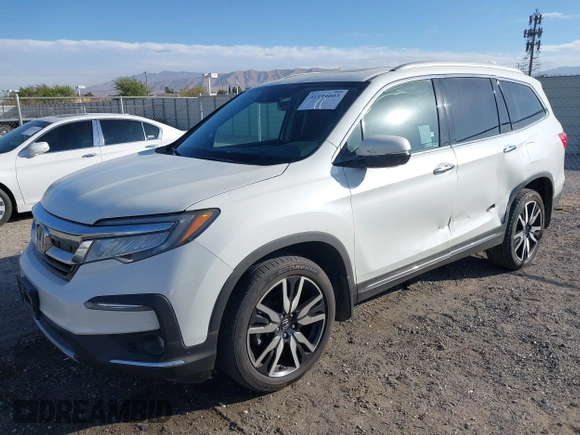 2022 Honda Pilot Touring 7-Passenger with VIN 5FNYF6H67NB017660, listed as a IAAI auction lot 41194603 with 87,301 mi miles. Bid and sale history available at carsss.com. Image 17.
