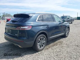 2021 Lincoln Nautilus Standard z VIN 2LMPJ8J92MBL10856, wystawiony jako IAAI lot #42204825 z przebiegiem 26 694 mil mil oraz . Historia ofert i sprzedaży dostępna na DreamBid. Obrazek 4.