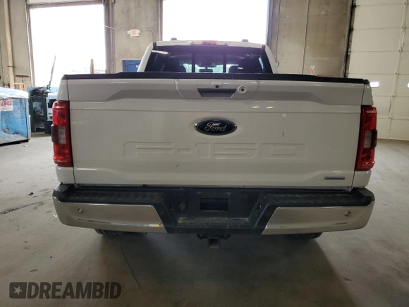 2021 Ford F-150 XL with VIN 1FTFW1E88MKE41611, listed as a Copart auction lot 61092115 with 83,277 mi miles and Salvage title. Bid and sale history available at DreamBid. Image 6.