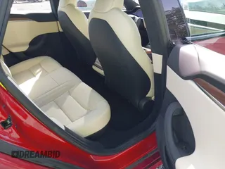2023 Tesla Model S with VIN 5YJSA1E5XPF516779, listed as a IAAI auction lot 42110737 with 16,465 mi miles and . Bid and sale history available at DreamBid. Image 8.