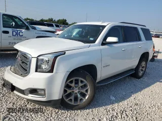 2017 GMC Yukon SLT with VIN 1GKS1BKC2HR295235, listed as a Copart auction lot 66477894 with 0 mi miles and Salvage Title. Bid and sale history available at carsss.com. Image 1.