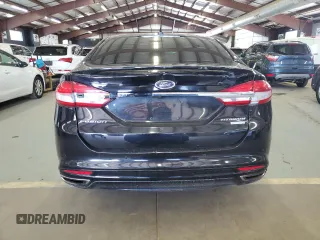 2017 Ford Fusion Titanium z VIN 3FA6P0K96HR124759, wystawiony jako Copart lot #61414395 z przebiegiem 175 655 mil mil oraz Czysty tytuł • Clean title. Historia ofert i sprzedaży dostępna na DreamBid. Obrazek 6.
