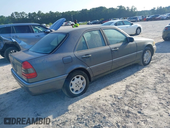 1997 Mercedes-Benz C with VIN WDBHA28E7VA496104, listed as a IAAI auction lot 42773052 with 258,692 mi miles and . Bid and sale history available at DreamBid. Image 4.