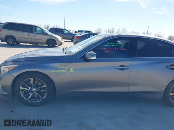 2015 Infiniti Q50 Premium with VIN JN1BV7AP0FM355933, listed as a IAAI auction lot 41684066 with 116,230 mi miles and . Bid and sale history available at DreamBid. Image 15.