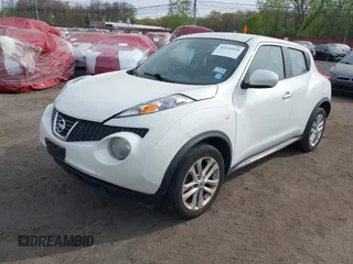 2014 Nissan Juke S with VIN JN8AF5MV6ET482103, listed as a IAAI auction lot 42126935 with 125,506 mi miles. Bid and sale history available at carsss.com. Image 2.
