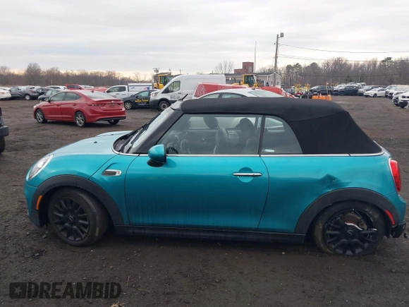 2019 MINI Convertible Cooper with VIN WMWWG5C52K3H08648, listed as a IAAI auction lot 41686314 with 40,728 mi miles and . Bid and sale history available at DreamBid. Image 20.