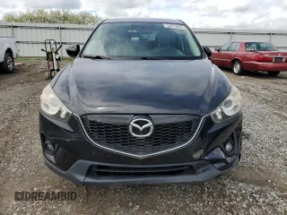 2014 Mazda CX-5 Grand Touring with VIN JM3KE4DY3E0304908, listed as a Copart auction lot 53873655 with 144,382 mi miles and Salvage Title. Bid and sale history available at DreamBid. Image 5.