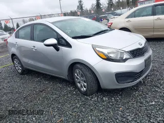 2014 Kia Rio LX with VIN KNADM4A31E6327403, listed as a IAAI auction lot 41915952 with 127,167 mi miles. Bid and sale history available at carsss.com. Image 1.