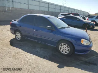 2002 Kia Rio with VIN KNADC123X26125297, listed as a Copart auction lot 74368764 with 72,025 mi miles and Salvage Title. Bid and sale history available at carsss.com. Image 4.