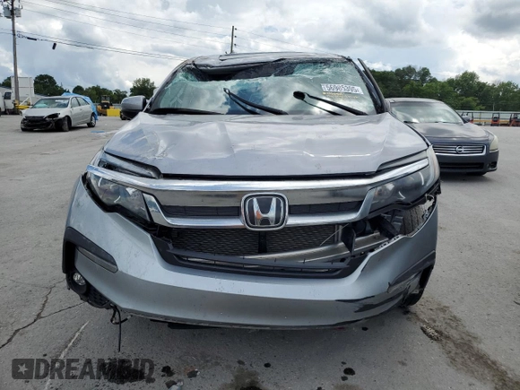 2021 Honda Pilot EX-L z VIN 5FNYF5H58MB008921, wystawiony jako Copart lot #56985395 z przebiegiem Nie podano mil oraz Szkoda całkowita • Salvage title. Historia ofert i sprzedaży dostępna na DreamBid. Obrazek 5.