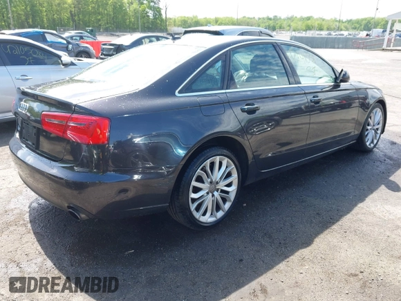 2013 Audi A6 Premium Plus with VIN WAUGFAFC2DN080928, listed as a IAAI auction lot 42141031 with 162,045 mi miles and . Bid and sale history available at DreamBid. Image 4.