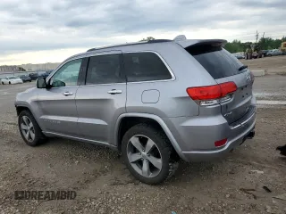 2015 Jeep Grand Cherokee High Altitude with VIN 1C4RJFCG2FC196563, listed as a Copart auction lot 56302315 with 143,759 mi miles and Salvage title. Bid and sale history available at DreamBid. Image 2.