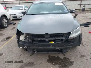2013 Volkswagen Jetta SE with VIN 3VWDP7AJ2DM418282, listed as a IAAI auction lot 42100785 with 131,383 mi miles and . Bid and sale history available at DreamBid. Image 12.