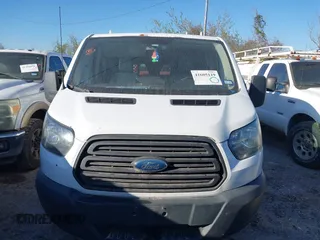 2015 Ford Transit Cargo with VIN 1FTNE1YGXFKA66907, listed as a IAAI auction lot 41605119 with 305,897 mi miles and . Bid and sale history available at DreamBid. Image 12.