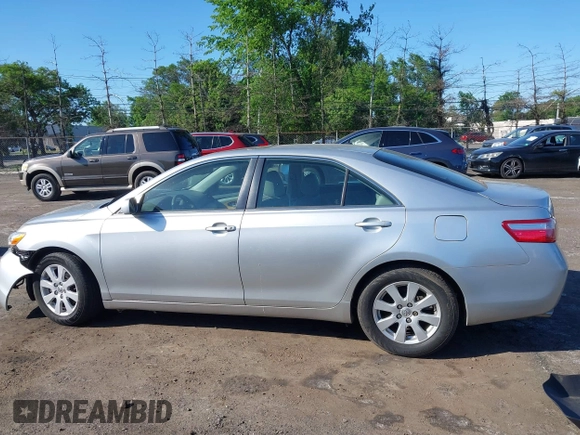 2007 Toyota Camry LE z VIN JTNBK46K473003622, wystawiony jako IAAI lot #42286264 z przebiegiem 105 630 mil mil oraz . Historia ofert i sprzedaży dostępna na DreamBid. Obrazek 15.