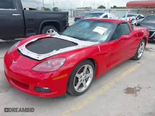 2005 Chevrolet Corvette with VIN 1G1YY24UX55116202, listed as a IAAI auction lot 40211162 with 55,579 mi miles. Bid and sale history available at carsss.com. Image 2.