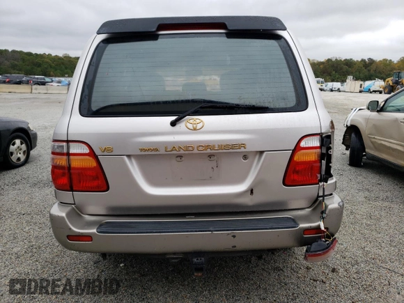 1999 Toyota Land Cruiser with VIN JT3HT05J4X0031312, listed as a Copart auction lot 78516674 with 308,642 mi miles and Salvage Title. Bid and sale history available at carsss.com. Image 6.