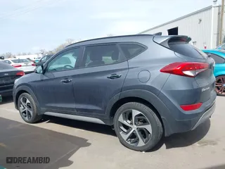 2018 Hyundai Tucson Value with VIN KM8J3CA24JU646807, listed as a IAAI auction lot 41960629 with 117,646 mi miles. Bid and sale history available at carsss.com. Image 14.