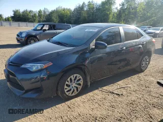2019 Toyota Corolla L with VIN 2T1BURHE9KC180282, listed as a Copart auction lot 65271095 with 196,995 mi miles and Salvage title. Bid and sale history available at DreamBid. Image 1.