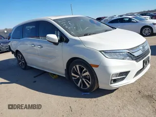 2018 Honda Odyssey Elite with VIN 5FNRL6H94JB065862, listed as a IAAI auction lot 41382127 with 101,774 mi miles and . Bid and sale history available at DreamBid. Image 1.