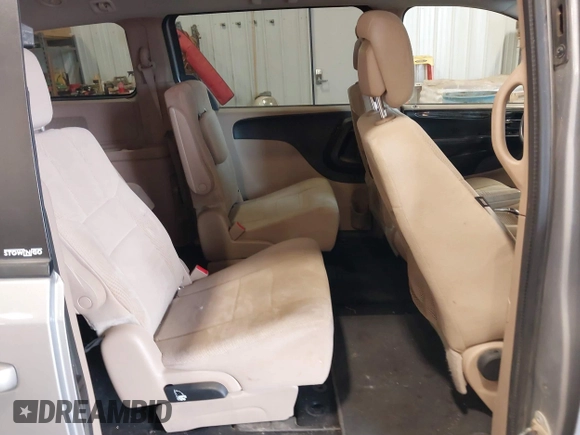 2014 Dodge Grand Caravan SXT with VIN 2C4RDGCG9ER213426, listed as a IAAI auction lot 41044553 with 175,140 mi miles and . Bid and sale history available at DreamBid. Image 8.