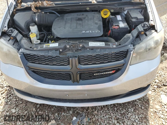 2014 Dodge Grand Caravan SXT with VIN 2C4RDGCG4ER114464, listed as a Copart auction lot 52480965 with 125,212 mi miles and Salvage Title. Bid and sale history available at DreamBid. Image 12.
