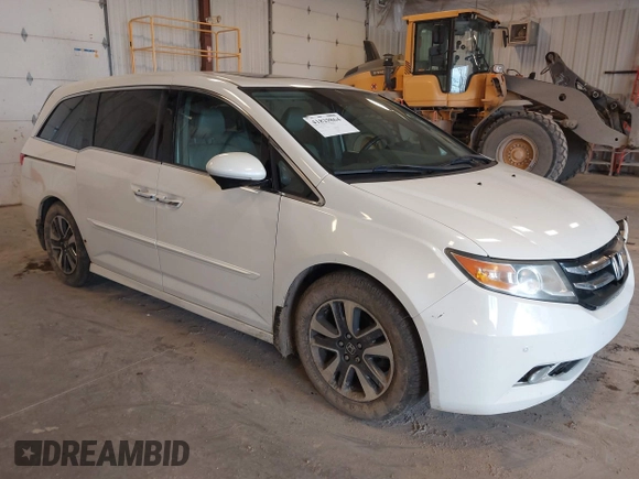 2015 Honda Odyssey Touring Elite with VIN 5FNRL5H97FB060060, listed as a IAAI auction lot 41829864 with Not Provided miles and . Bid and sale history available at DreamBid. Image 1.