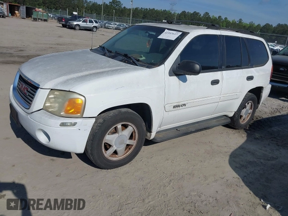 2003 GMC Envoy SLT with VIN 1GKDS13S832300090, listed as a IAAI auction lot 41993627 with 210,631 mi miles. Bid and sale history available at carsss.com. Image 2.
