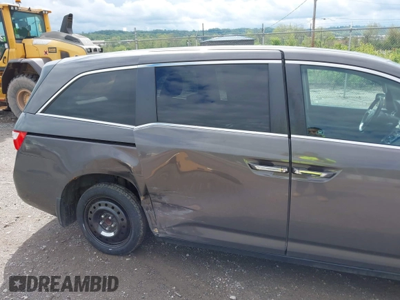 2012 Honda Odyssey EX-L with VIN 5FNRL5H68CB060487, listed as a IAAI auction lot 42176223 with 234,078 mi miles and . Bid and sale history available at DreamBid. Image 6.