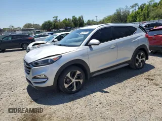 2018 Hyundai Tucson Sport z VIN KM8J33AL1JU801662, wystawiony jako Copart lot #53580595 z przebiegiem 97 712 mil mil oraz Szkoda całkowita • Salvage title. Historia ofert i sprzedaży dostępna na DreamBid. Obrazek 1.