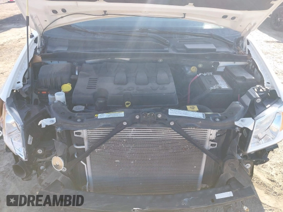 2010 Dodge Grand Caravan SXT with VIN 2D4RN5DX8AR239352, listed as a IAAI auction lot 41773487 with 86,084 mi miles and . Bid and sale history available at DreamBid. Image 10.