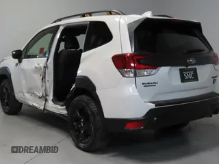 2023 Subaru Forester Wilderness with VIN JF2SKAMC7PH464218, listed as a Copart auction lot 59016725 with 8,827 mi miles and Salvage title. Bid and sale history available at DreamBid. Image 4.
