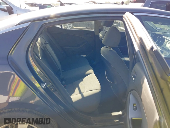 2015 Kia Optima LX with VIN KNAGM4A71F5568868, listed as a IAAI auction lot 42431920 with 138,217 mi miles and . Bid and sale history available at DreamBid. Image 8.