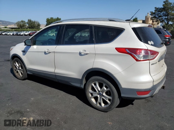 2014 Ford Escape Titanium z VIN 1FMCU0J9XEUD01904, wystawiony jako Copart lot #61819555 z przebiegiem 217 794 mil mil oraz Czysty tytuł • Clean title. Historia ofert i sprzedaży dostępna na DreamBid. Obrazek 2.
