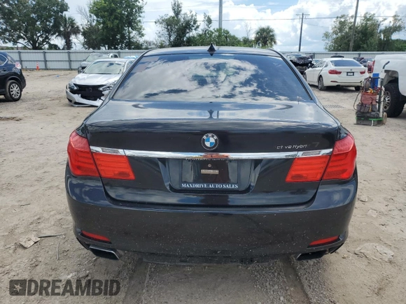 2011 BMW 7 Series with VIN WBAKX8C57BC198326, listed as a Copart auction lot 69985174 with 142,353 mi miles and Clean title. Bid and sale history available at DreamBid. Image 6.