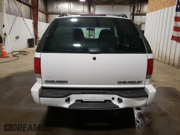 1999 Chevrolet Blazer LS with VIN 1GNCT18W5XK136973, listed as a Copart auction lot 60284865 with 199,759 mi miles and Clean title. Bid and sale history available at DreamBid. Image 6.