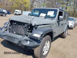 2021 Jeep Wrangler Unlimited Willys with VIN 1C4HJXDN4MW703859, listed as a IAAI auction lot 42071327 with 27,027 mi miles and . Bid and sale history available at DreamBid. Image 2.
